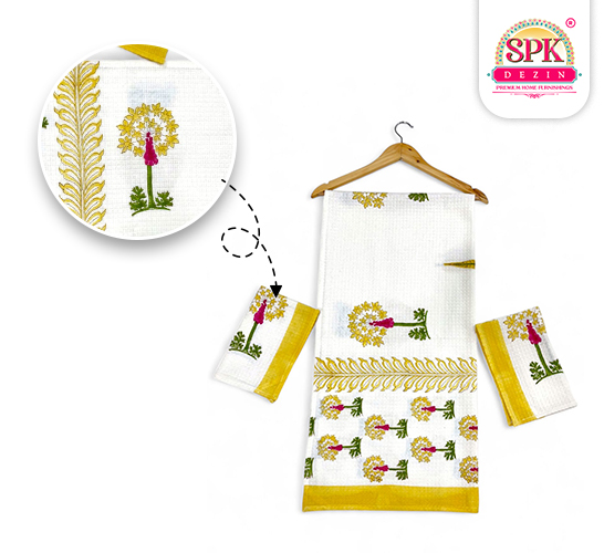 golden and green flower towel